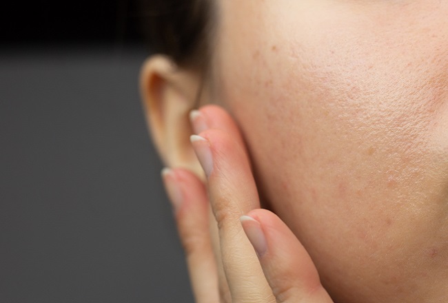 Close up of woman's face showing visible pores