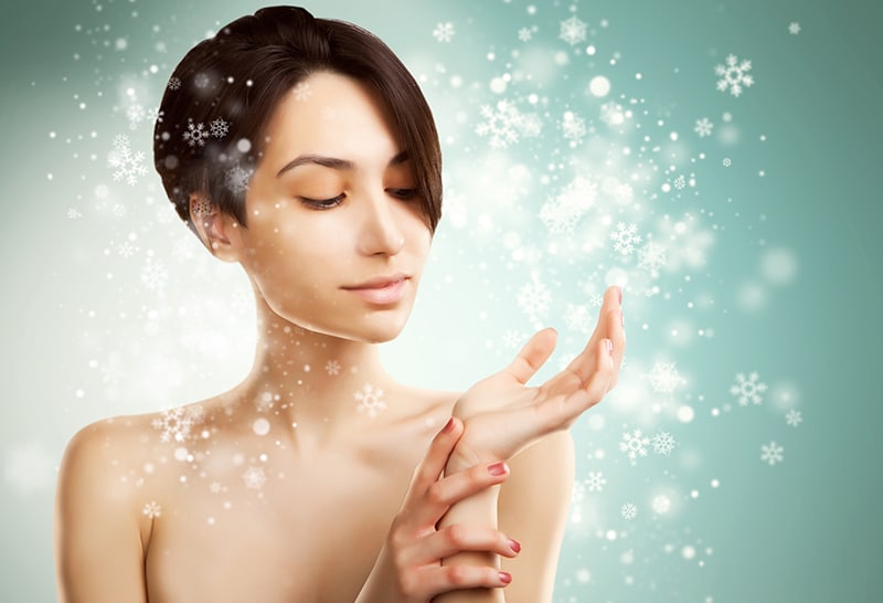 Beautiful woman with glowing skin, winter theme Beautiful woman with glowing skin, winter theme